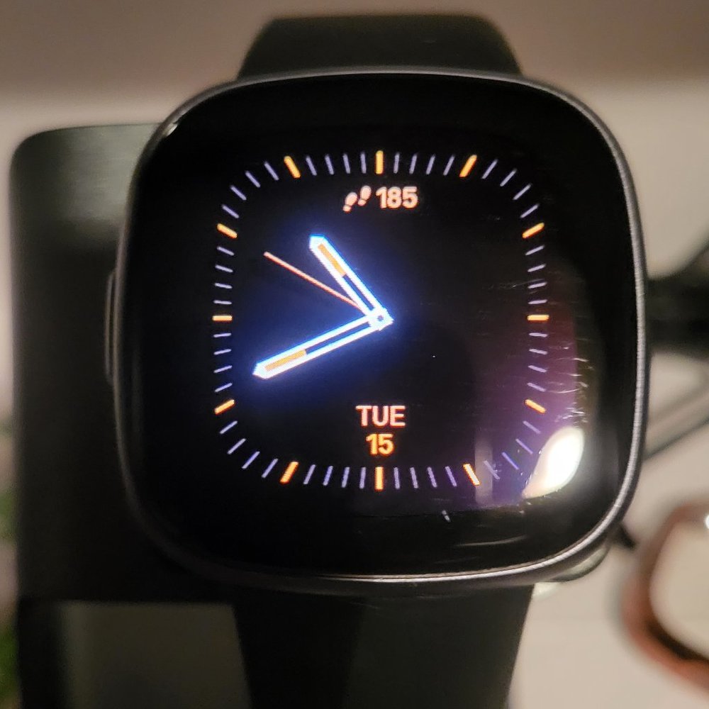 Versa 4 w/ charger, 9 protective cases